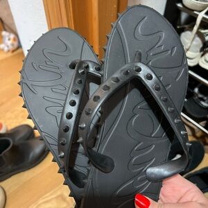Red soles flip flops